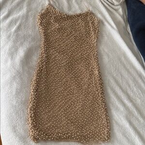 Chic Pearl-Studded Beige Mini Dress